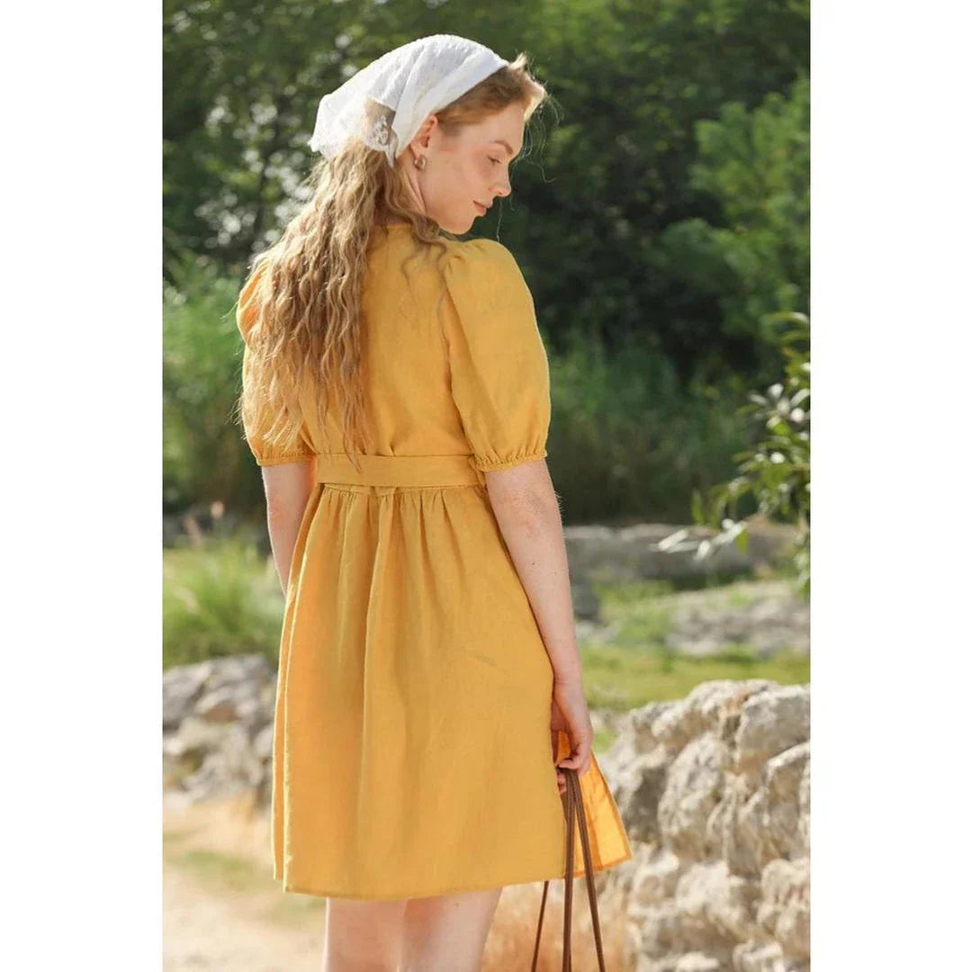 Stylish linen mini dress with puff sleeves and lace-up detail, perfect for Kiwi summer