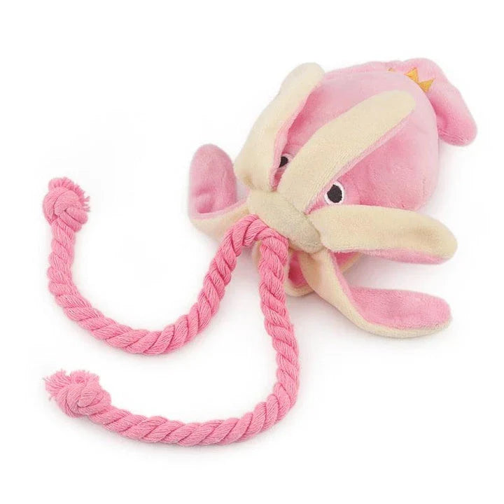 Cuddly pink squid-shaped plush toy for dogs, made of soft fleece material for snuggles and play