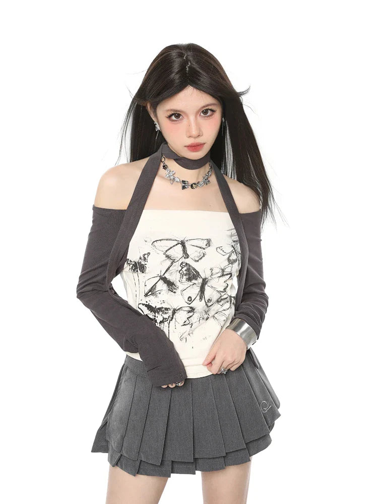 Stylish off-shoulder long sleeve top with elegant butterfly print design, slim-fit silhouette, and short length for a flattering, chic look.