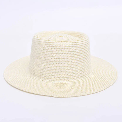 Elegant ladies' summer beach sun hat with wide brim, designed for sun protection and style in New Zealand
