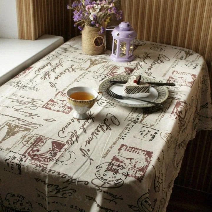 Elegant Paris-themed cotton and linen tablecloth with a delicate pattern, perfect for transforming your dining space