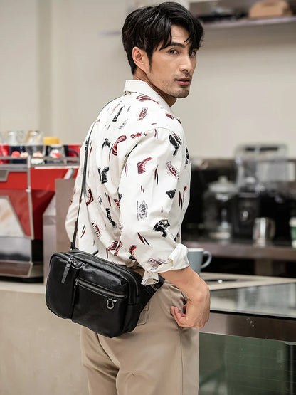 Stylish New Zealand-made leather shoulder bag in black for men, featuring a spacious design and adjustable strap for everyday use.