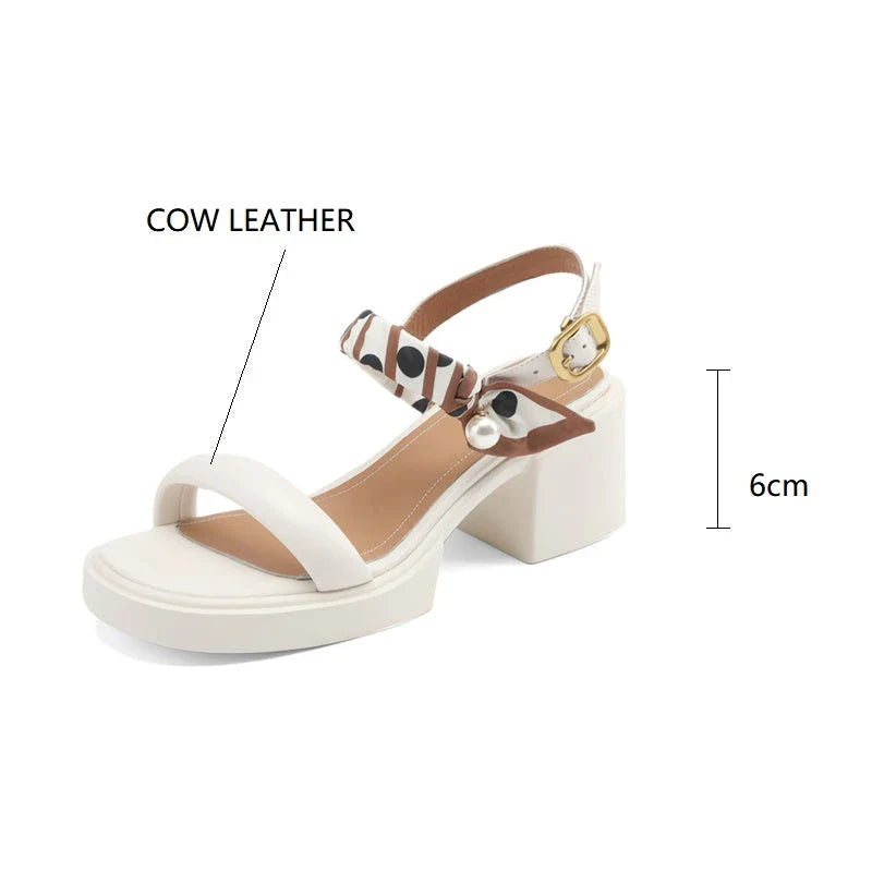 Chic open-toe leather platform sandals with adjustable buckle strap and square heel, perfect for Kiwi summer style.