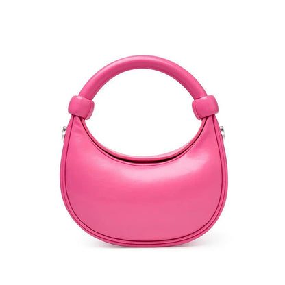Rose Pink Leather Crescent Crossbody Bag with a unique half-moon design, showcasing premium craftsmanship and versatile functionality