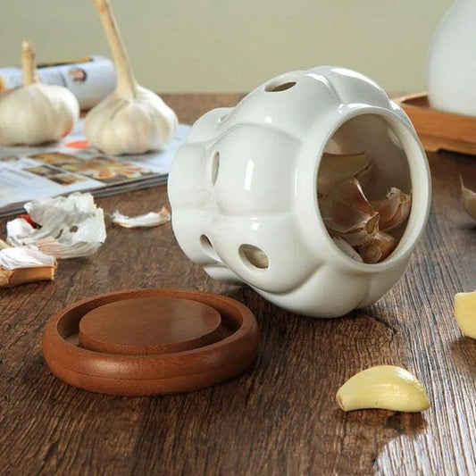 Stylish white ceramic garlic storage jar with wooden lid, designed for modern Kiwi kitchens