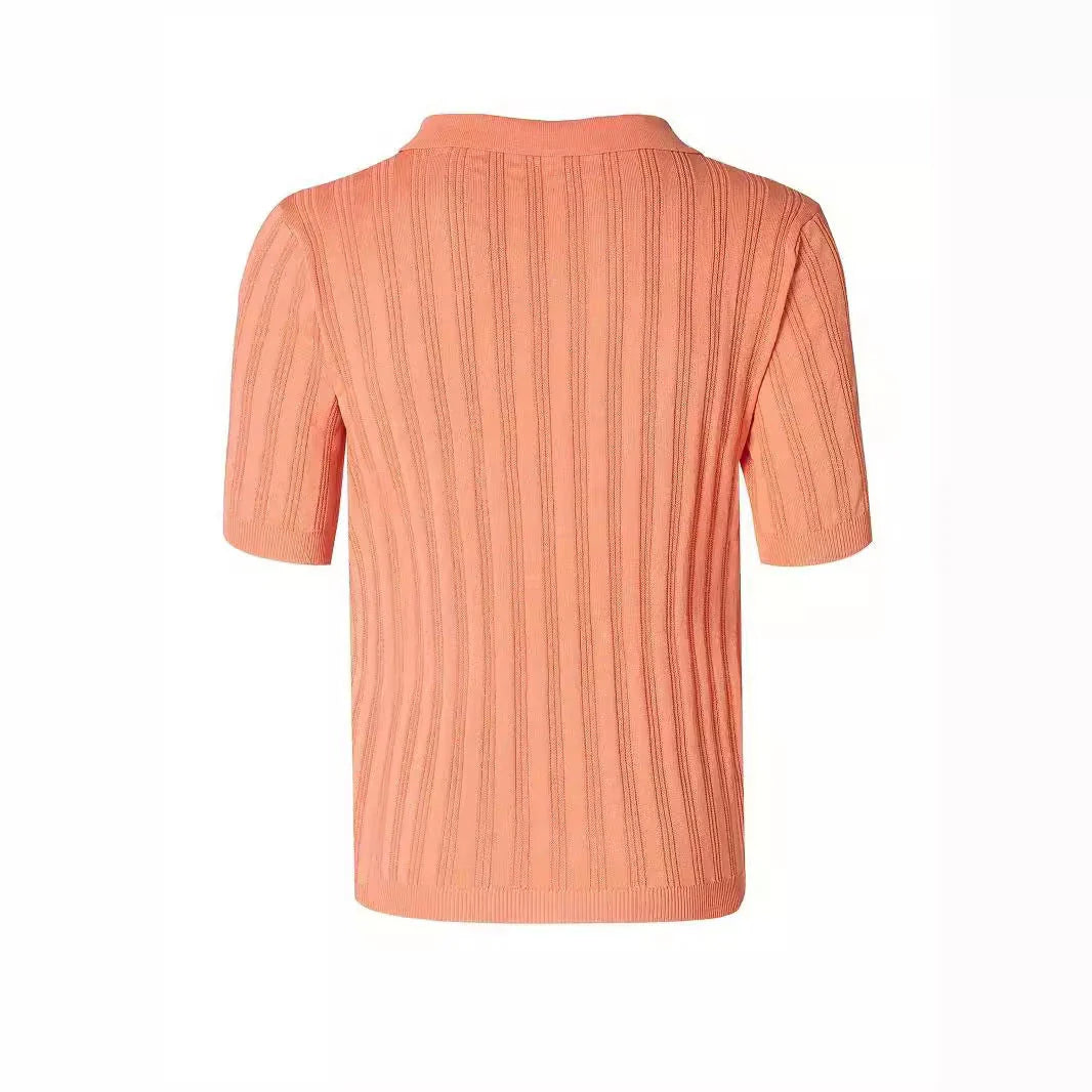 Premium Kiwi-made acrylic knitted tee in a vibrant orange-red hue, featuring a slim-fit design and classic short sleeves