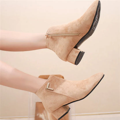 Pointed toe boots with low chunky heels in Black and Beige colors, designed for comfortable and stylish wear in New Zealand