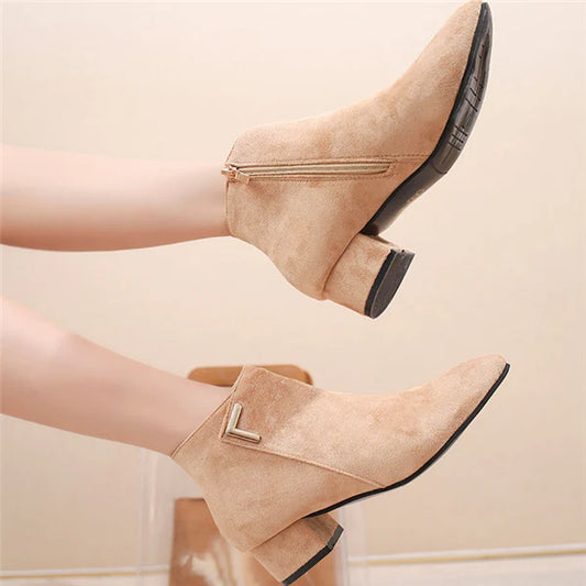 Pointed toe boots with low chunky heels in Black and Beige colors, designed for comfortable and stylish wear in New Zealand