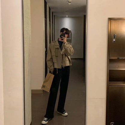 A stylish vintage-inspired jacket with an overalls-inspired design, featuring a lightly mature aesthetic and premium construction.