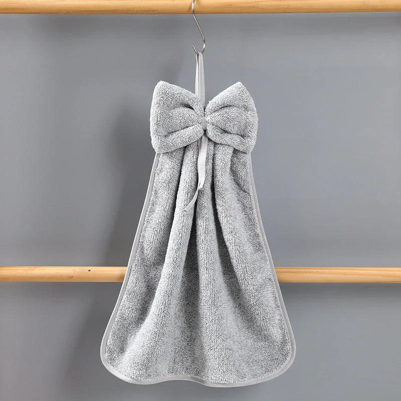 Soft, absorbent coral velvet hand towels with a unique bow design, perfect for Kiwi homes