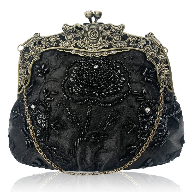 Bead embroidered fashion bag with silk surface, nylon exterior, and magnetic buckle closure