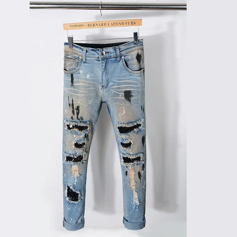 Vintage-inspired jeans with rhinestone and ink splash detailing, perfect for the modern Kiwi lifestyle