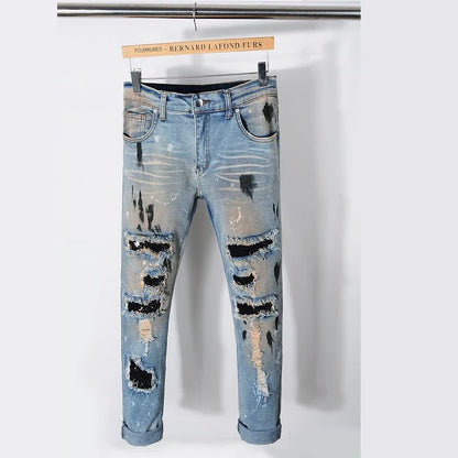 Vintage-inspired jeans with rhinestone and ink splash detailing, perfect for the modern Kiwi lifestyle