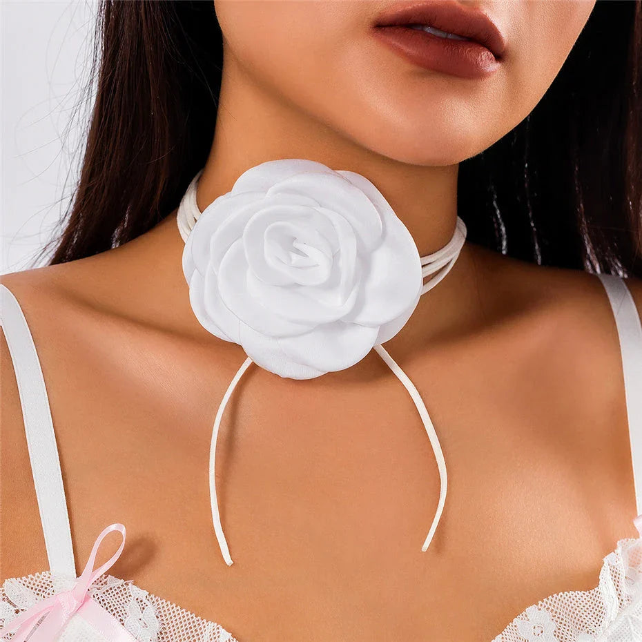 Elegant choker necklace with a large, geometric rose flower pendant in black and white colors