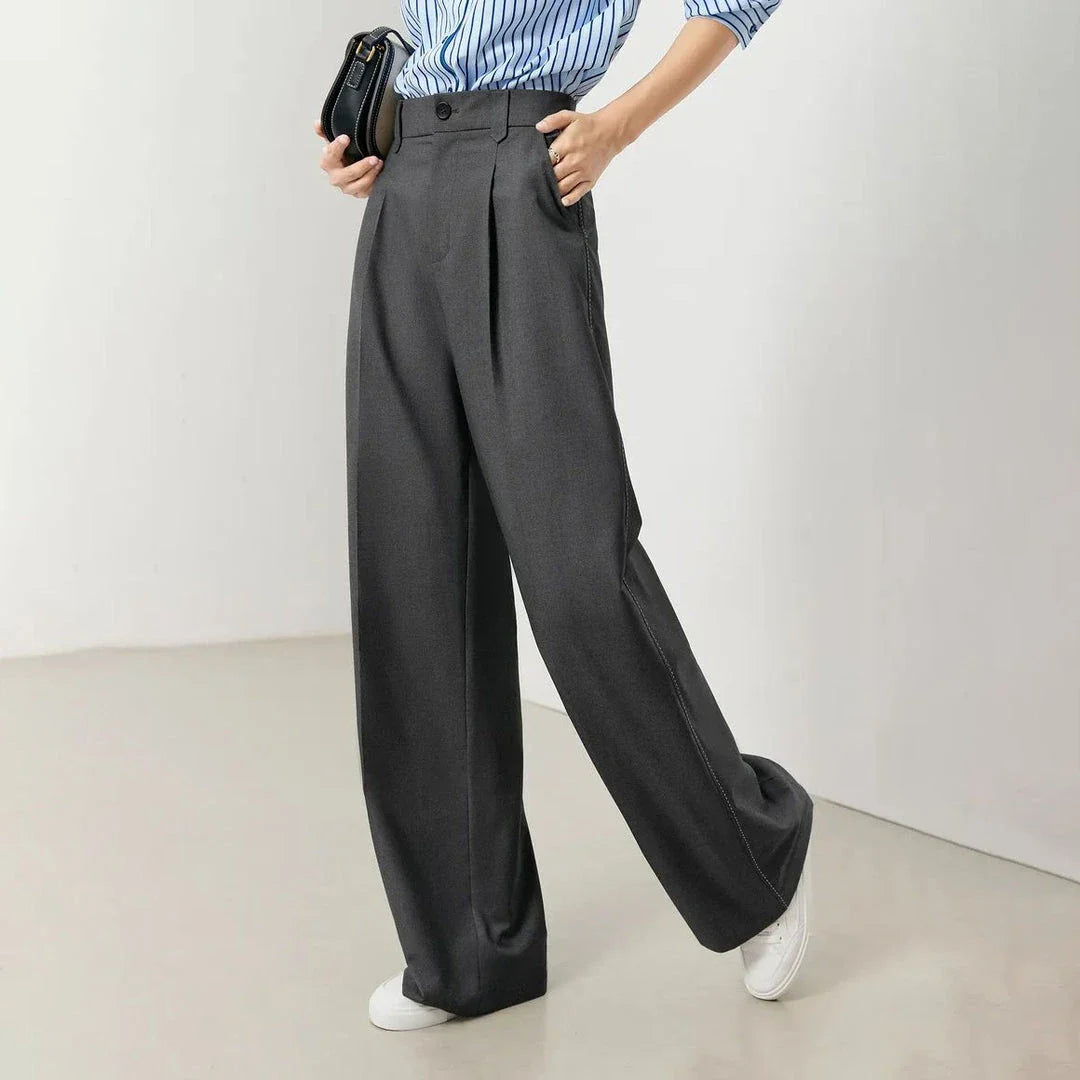 Versatile high-waist wide-leg grey trousers for Kiwi women, offering a chic and comfortable design.