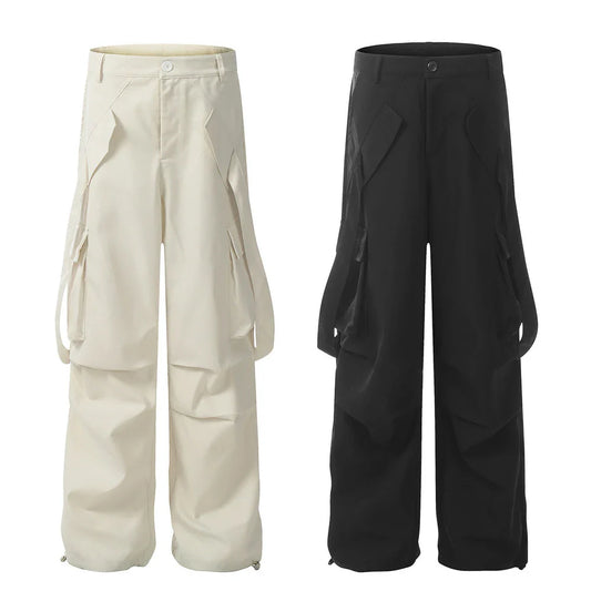 Stylish black overalls with pleated pockets, designed for the active Kiwi lifestyle