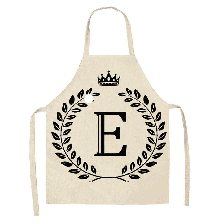 A crown and letter printed kitchen apron made of high-quality cotton and linen, suitable for both men and women in New Zealand kitchens.