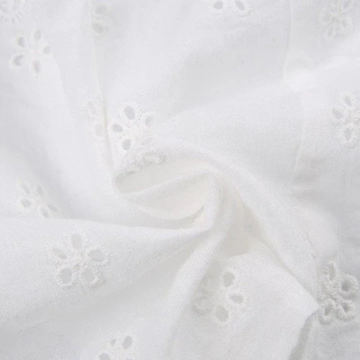 A stylish white tube top with a lace-up design, perfect for adding a touch of Kiwi fashion flair to your wardrobe.