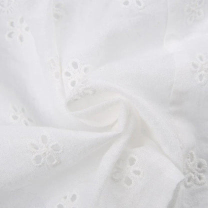 A stylish white tube top with a lace-up design, perfect for adding a touch of Kiwi fashion flair to your wardrobe.