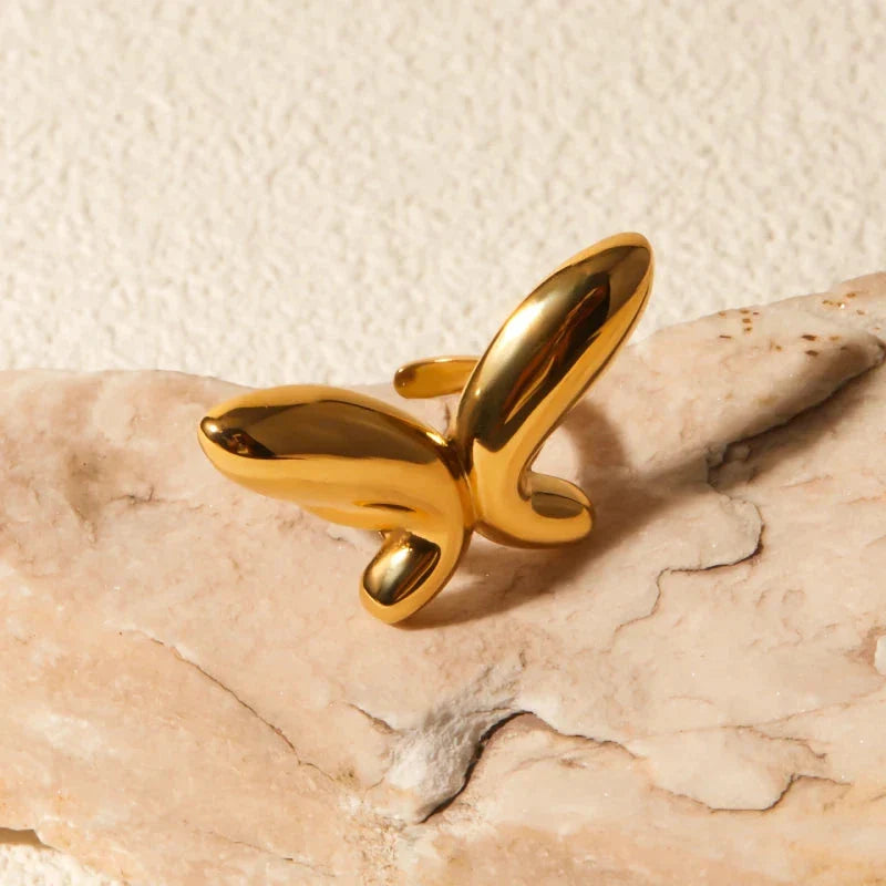 Elegant 18K gold-plated stainless steel butterfly ring with a whimsical open design, perfect for Kiwi celebrations and everyday wear.