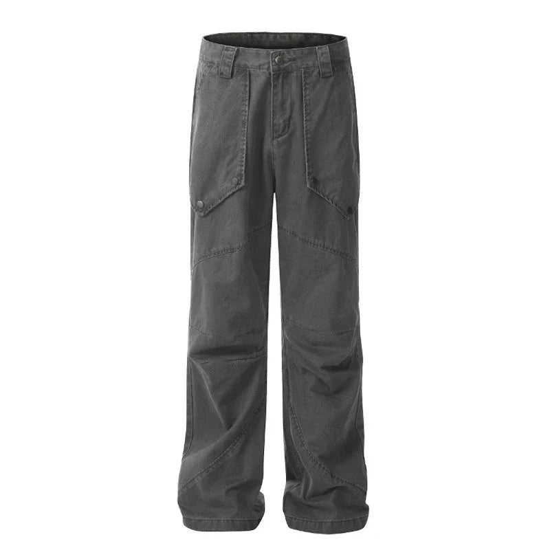 Black washed micro-flared trousers with pleated design and large pockets, perfect for the modern Kiwi lifestyle