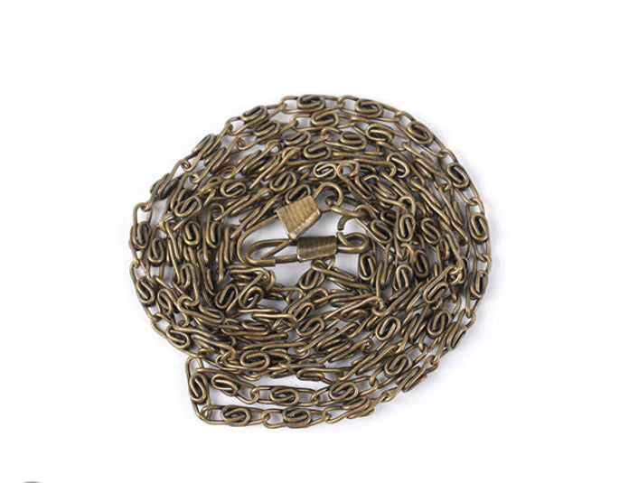 Bead embroidered fashion bag with silk surface, nylon exterior, and magnetic buckle closure