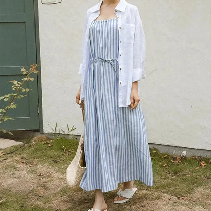 A stylish striped cotton linen maxi dress with an elegant A-line silhouette, perfect for summer in New Zealand.