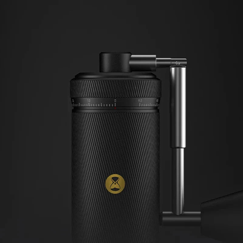 Premium manual coffee grinder with sleek design, stainless steel burrs, and external grind adjustment for customizable brewing