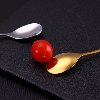 Stylish stainless steel dessert spoons with a mirror-polished finish, suitable for Kiwi cafes and homes