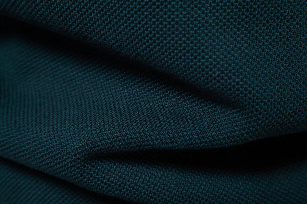 A stylish, slim-fit sweater in a modern colour-blocking design of Lake Green, White, and Grey, made with premium cotton for exceptional comfort and New Zealand casual style.