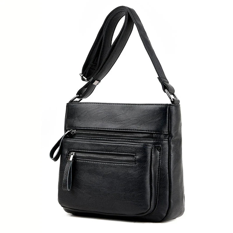 Soft leather shoulder bag in a classic box shape with a trendy tote silhouette, perfect for the modern Kiwi mum