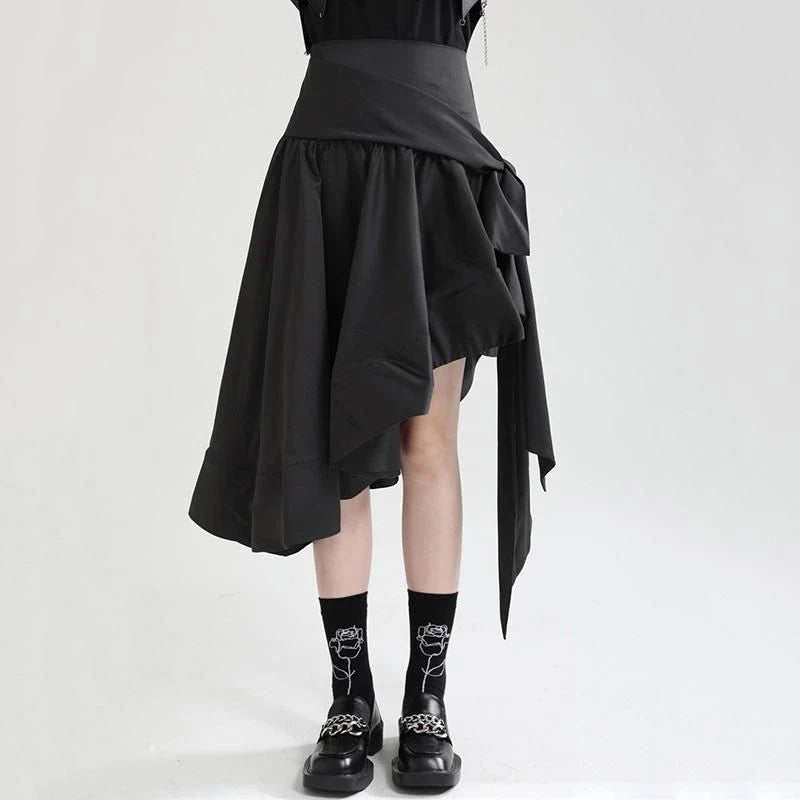 A stylish asymmetric ruffle skirt in a high-waist design, made from a durable cotton-polyester blend fabric.