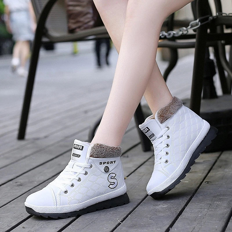Leather High-waist Velvet Warm Flat-bottomed Middle School Short Boots in stylish white color with cross-strap detailing