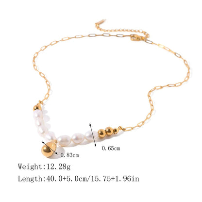 Elegant pearl and gold pendant necklace with a delicate gold drop, a timeless accessory for New Zealanders