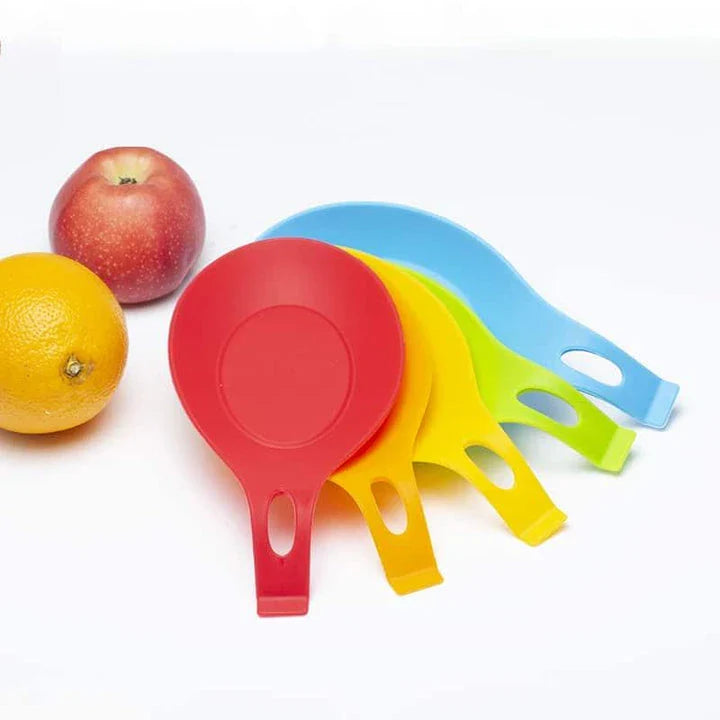 Heat-resistant silicone spoon mats in various vibrant colours, perfect for protecting Kiwi kitchen benchtops