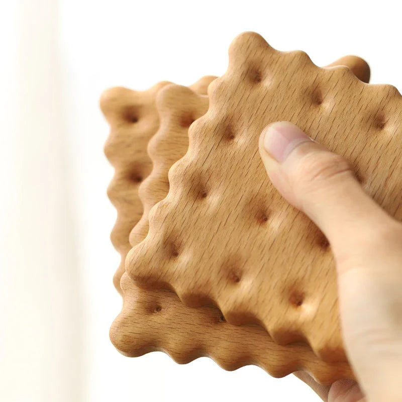 Natural wooden cookie-shaped coasters in beige and brown, handcrafted in New Zealand from premium solid wood