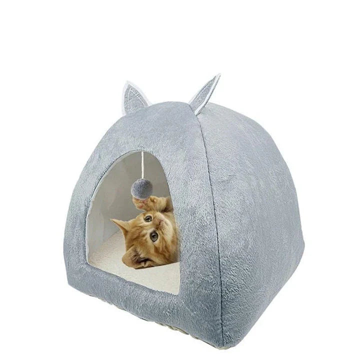 Cosy and foldable cat bed with interactive ball toy, available in a range of stylish colours to match your home decor