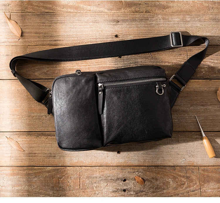 Stylish New Zealand-made leather shoulder bag in black for men, featuring a spacious design and adjustable strap for everyday use.