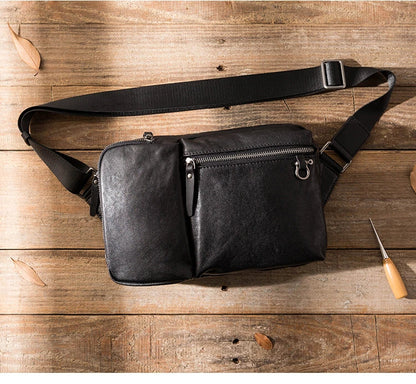 Stylish New Zealand-made leather shoulder bag in black for men, featuring a spacious design and adjustable strap for everyday use.