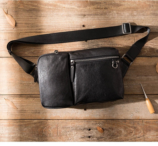 Stylish New Zealand-made leather shoulder bag in black for men, featuring a spacious design and adjustable strap for everyday use.