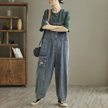 Trendy denim pants with embroidered straps for women, available in light blue color and various sizes from M to XXL