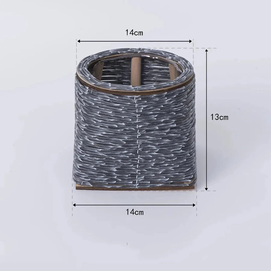 Hand-woven rattan planter with lush greenery, perfect for indoor and outdoor display