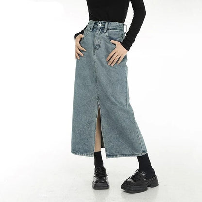 A stylish vintage-inspired denim midi skirt with a front slit, perfect for casual and special occasions.