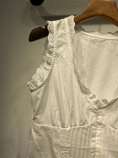 A stylish embroidered lace tank top with a sweet u-collar neckline, made from premium Kiwi-grown cotton.
