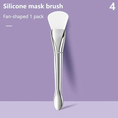 A soft, flexible silicone makeup and mask brush with a durable plastic handle, perfect for precise, mess-free application of facial products.