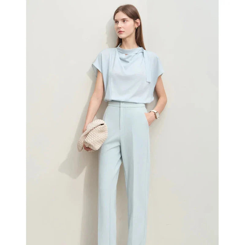 Minimalism Summer Solid Women's Blouse in Blue, featuring a loose swing neck, tie sleeves, and hollow-out decoration for a chic, breathable summer office look.