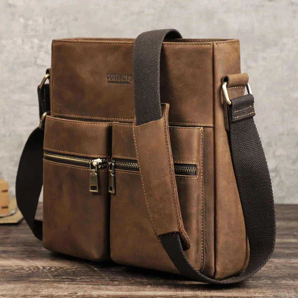Premium retro leather messenger bag with single adjustable shoulder strap, multiple interior pockets, and classic coffee color for New Zealand men