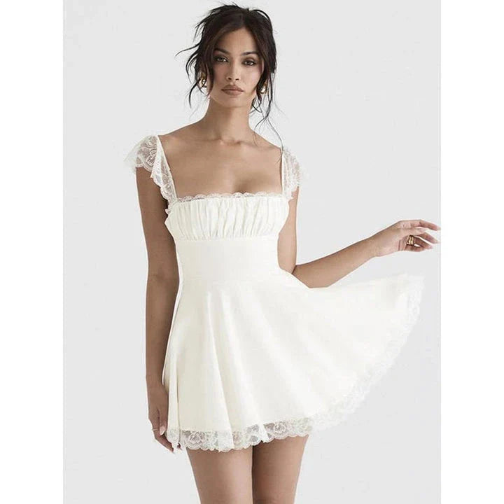 Elegant white lace mini dress with backless design, perfect for summer events in New Zealand