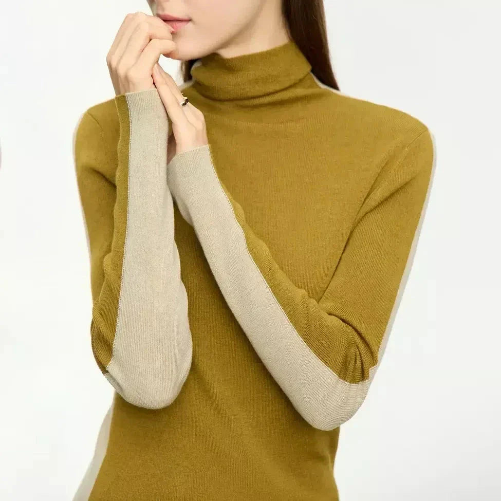 Elegant patchwork turtleneck sweater with a slim fit design, featuring a unique pattern and high-quality blend of materials for a stylish and comfortable look.