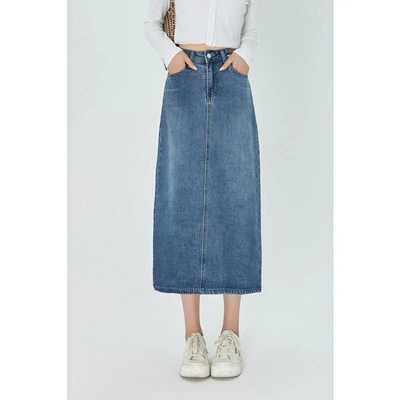 A stylish blue A-line midi denim skirt with a flattering empire waistline, perfect for the modern Kiwi woman's wardrobe
